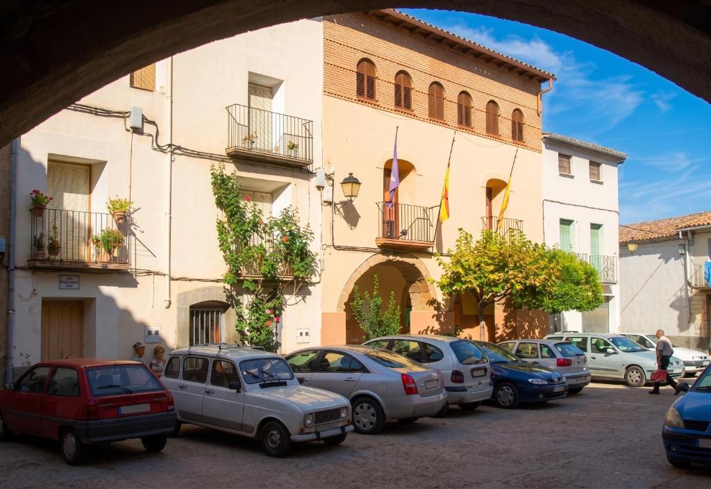 a group of cars parked in front of a building at Chic apartment in Tolva, mountain view, 75 m², fireplace in Tolva