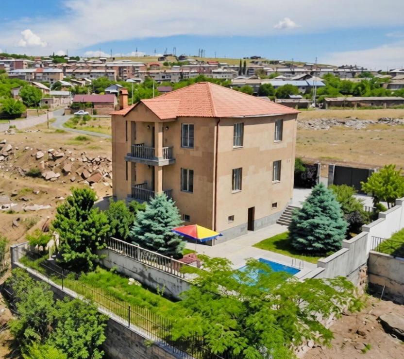 a large house with a fence around it at Yeganyan's Home in Ashtarak