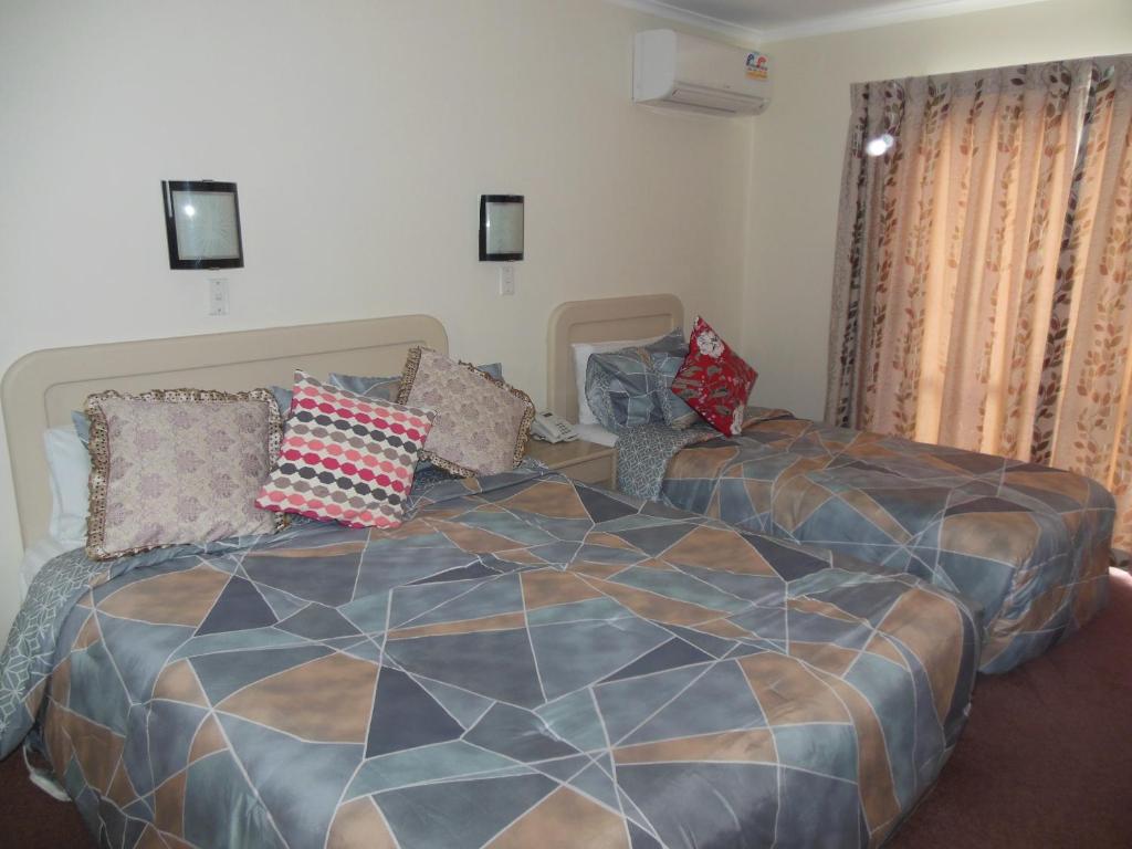 ASURE Camelot Arms Motor Lodge - Resim 7