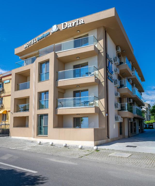 a building with a sign that reads delta at Daria Boutique Hotel in Eforie Sud