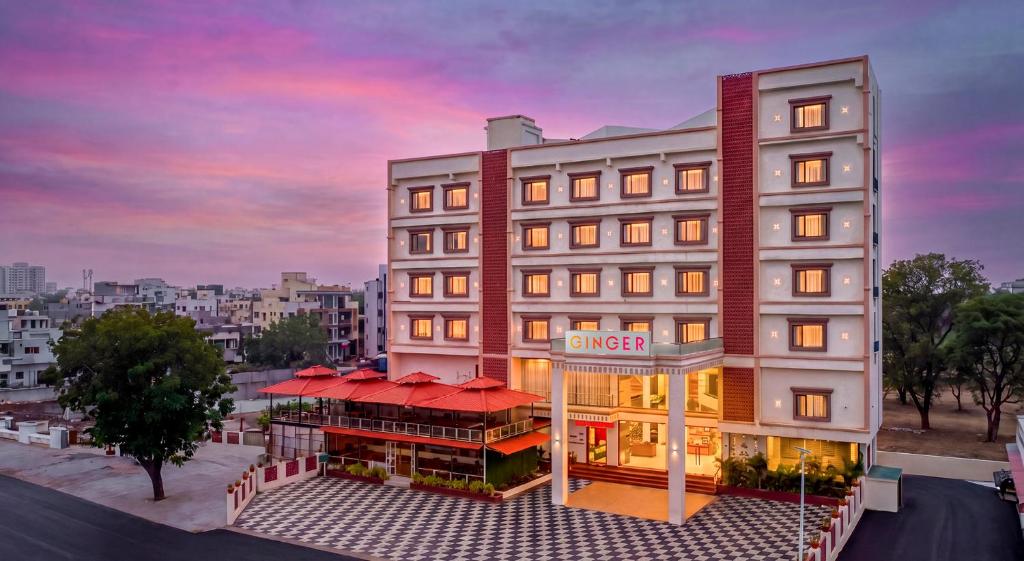 a rendering of a hotel with a sunset in the background at Ginger Somnath in Somnath