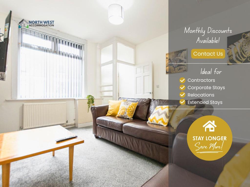 a living room with a couch and a table at Modern 2-Bedroom Home in Bolton Spacious & Comfortable in Bolton