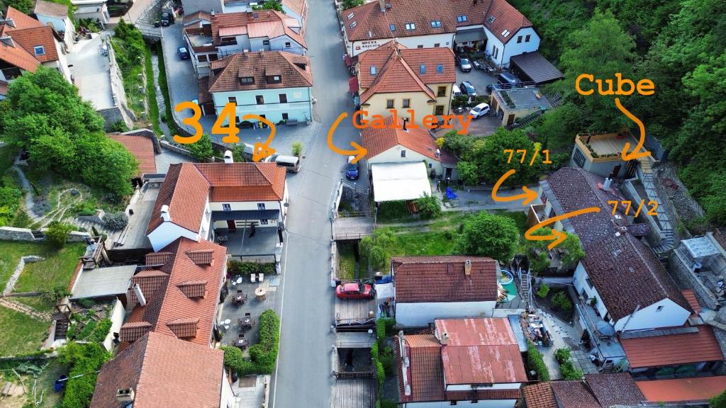 an aerial view of a city with houses and roofs at Karlštejn 34 in Karlštejn