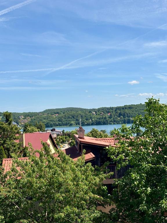 a view of a lake from the roof of a house at Perła Chmielna in Chmielno