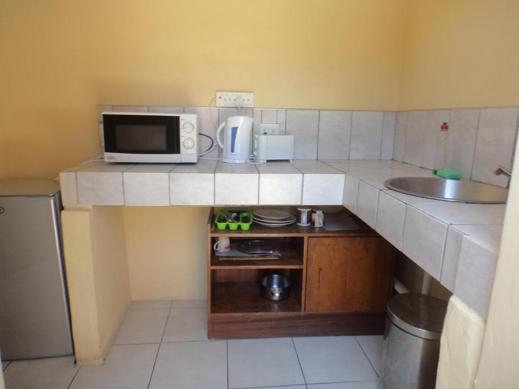Skippers backpackers CC - Habitación Triple Con Baño Privado