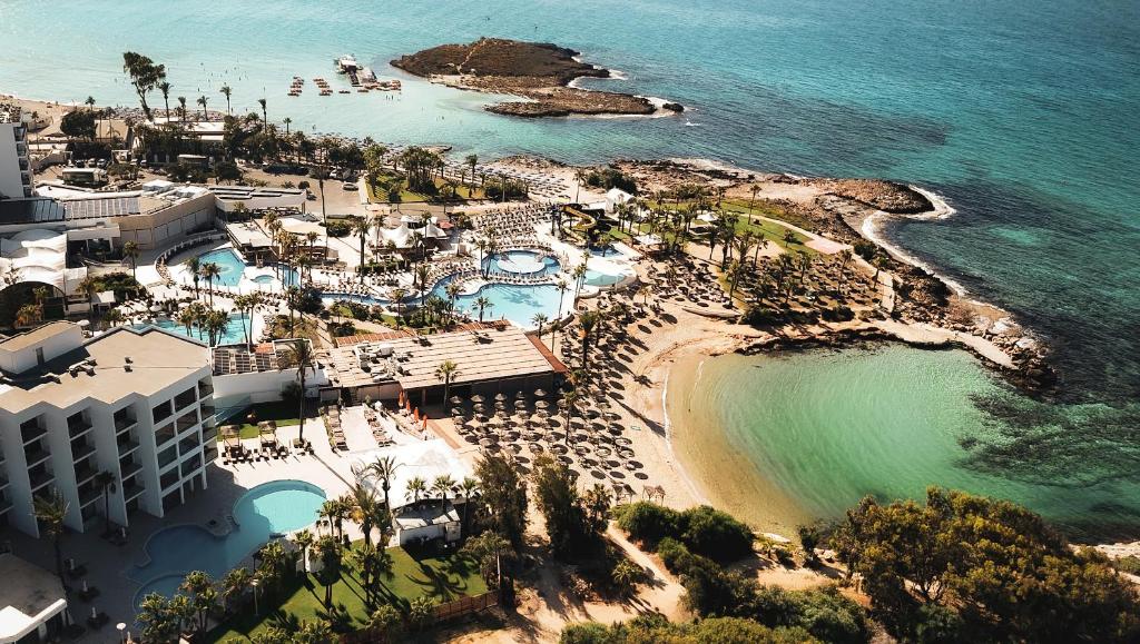 an aerial view of a resort near the ocean at Adams Beach Hotel & Spa in Ayia Napa
