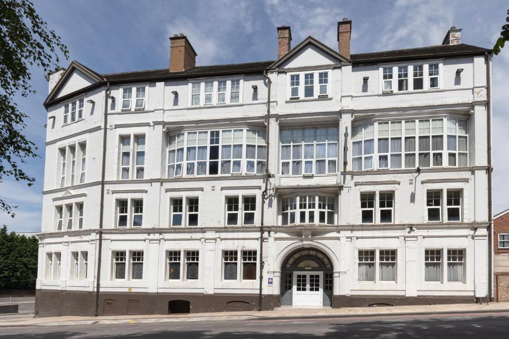a large white building with a lot of windows at Best Western Stoke on Trent City Centre Hotel in Stoke on Trent