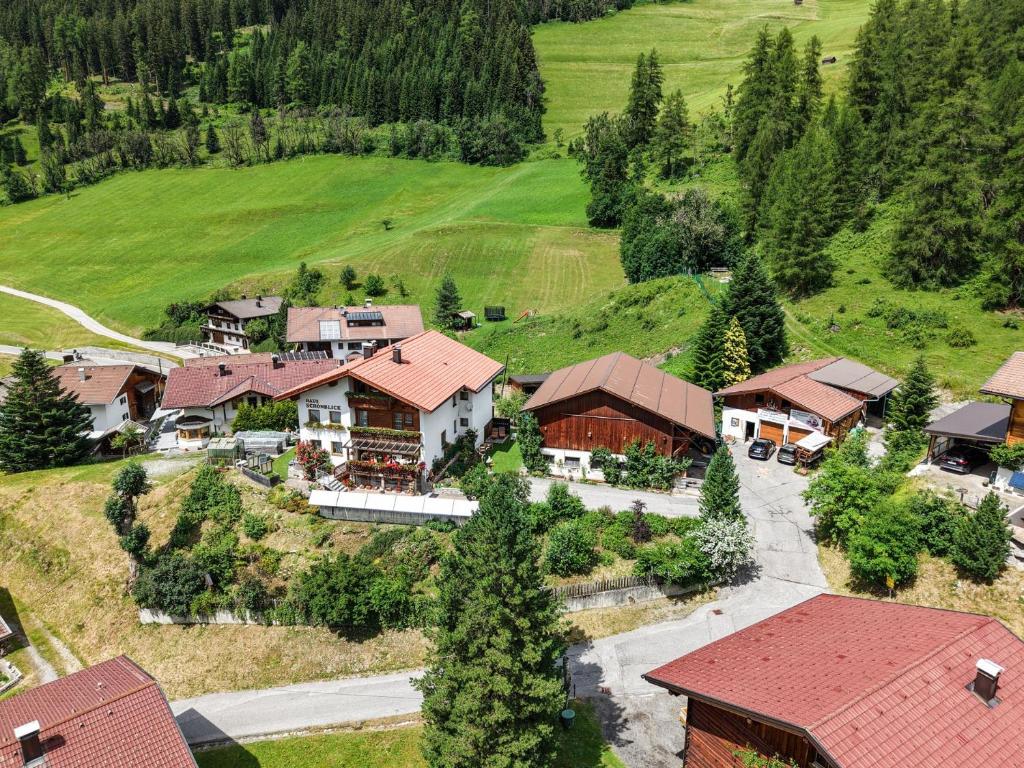 an aerial view of a house in a mountain at Haus Schönblick in Bschlabs