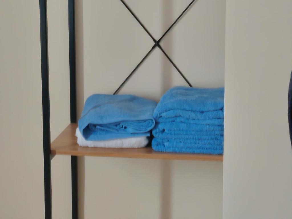 a shelf with two towels on it at RPCB Condo Rental in Cagayan de Oro