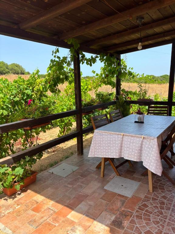 a table and chairs sitting on a patio at Casa Vittoria in Palau