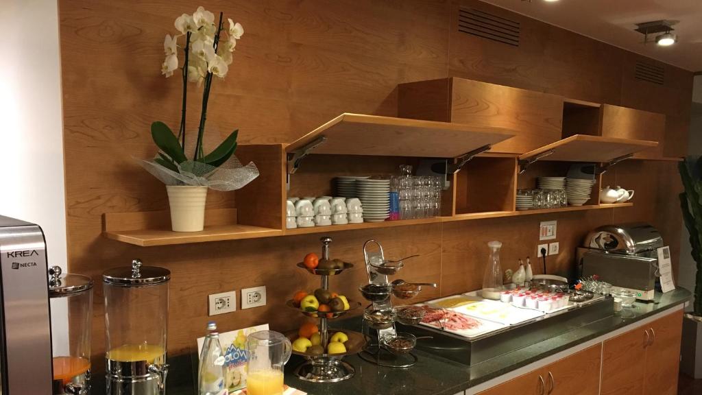 Kuchyň nebo kuchyňský kout v ubytování Park Hotel Il Vigneto