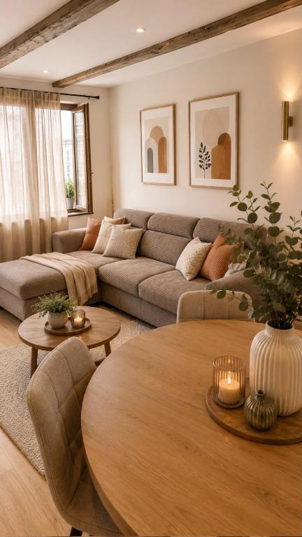 a living room with a couch and a table at House in Obernai in Obernai
