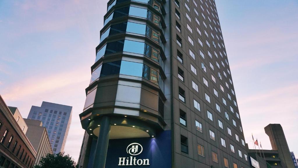 a tall building with the hilton sign in front of it at Hilton Boston Back Bay in Boston