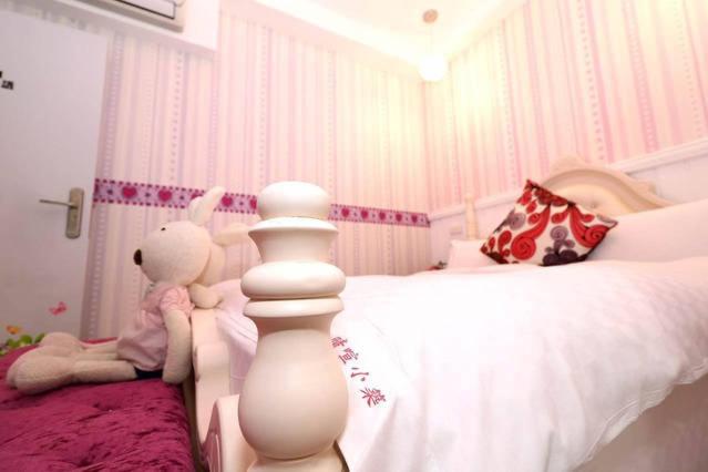 Postel nebo postele na pokoji v ubytování Qing Noise Villas