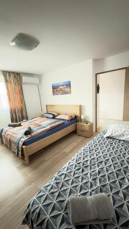 Un pat sau paturi într-o cameră la Roxen House