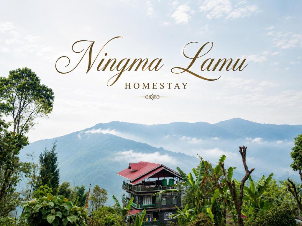 a picture of a house with mountains in the background at Ningma Lamu Homestay in Mangpu