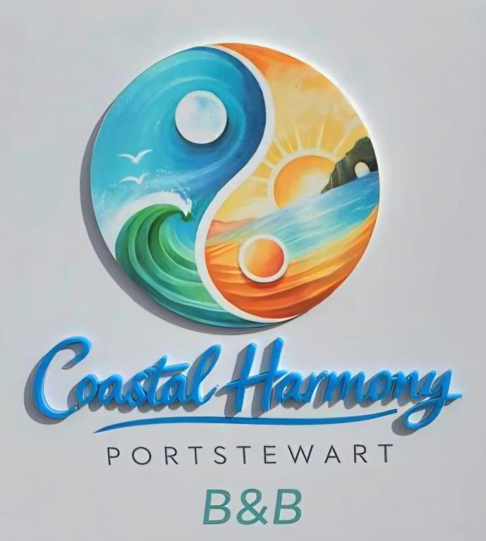 a sign for a resort with the words coastal hammingport logo at Coastal Harmony B&B in Portstewart