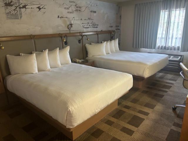 two beds in a hotel room with two bedsvisor at Primm Valley Hotel & Casino in Jean