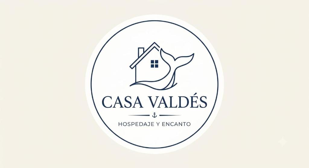 a label for a cottage with a house in a circle at Casa Valdés in Puerto Pirámides