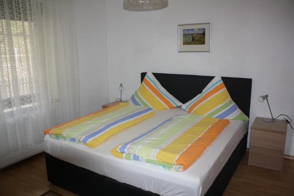 Postel nebo postele na pokoji v ubytování Ferienwohnung Ziemons