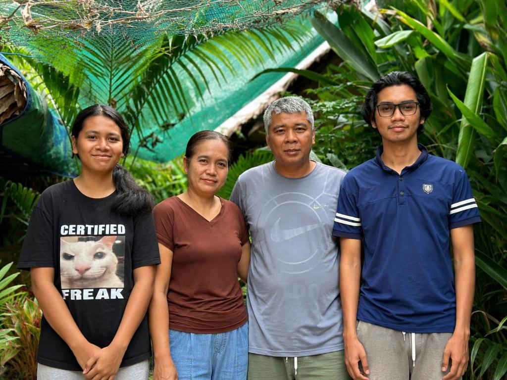 a group of people standing next to each other at Siem Reap Homesteading in Siem Reap
