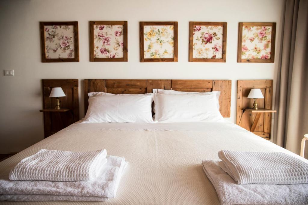 Postel nebo postele na pokoji v ubytování Agriturismo Corte Ruffoni