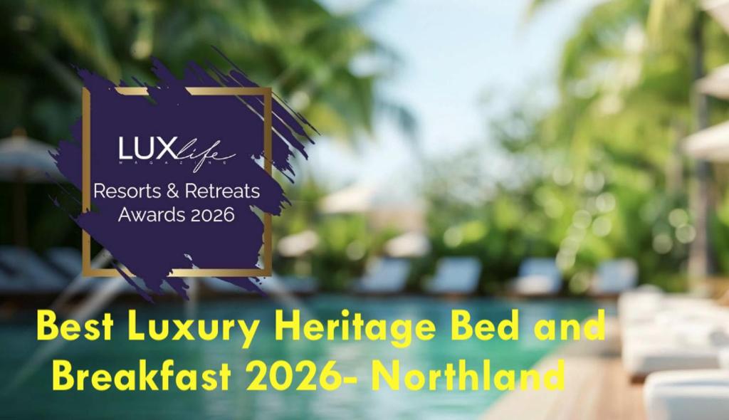 a sign that says best luxury heritage bed and breakfast at Pheasant Lodge in Paparoa