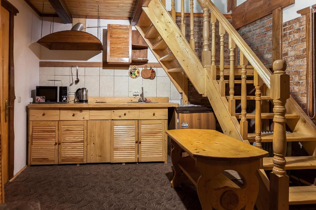 Kuchyň nebo kuchyňský kout v ubytování Vatra Hotel