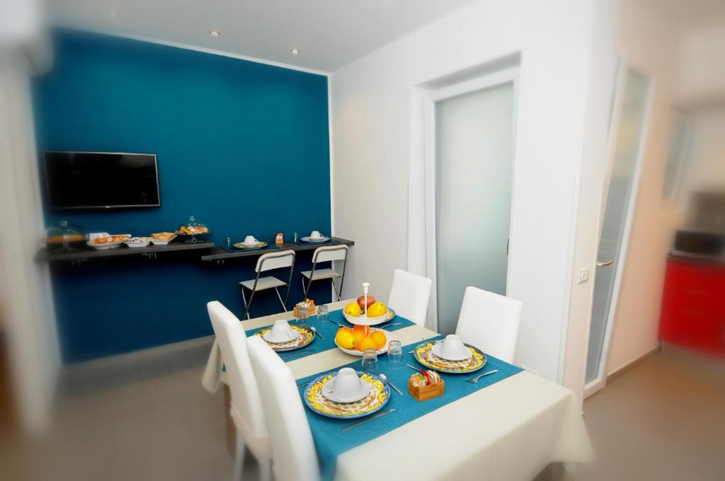 TV a/nebo společenská místnost v ubytování B&B Le Porte Del Centro