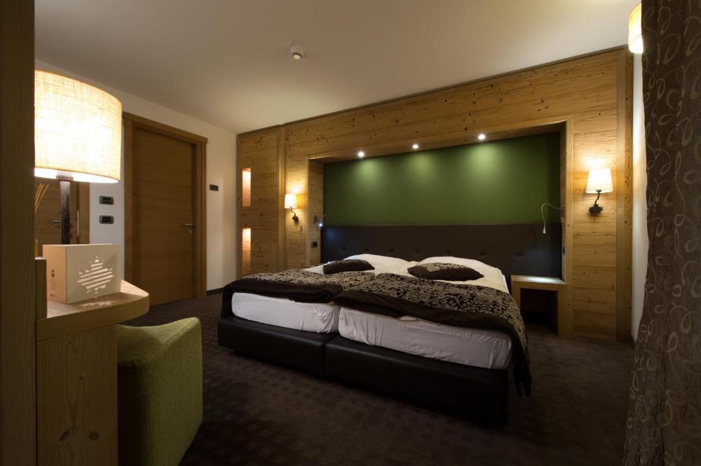 Postel nebo postele na pokoji v ubytování Hotel Vedig