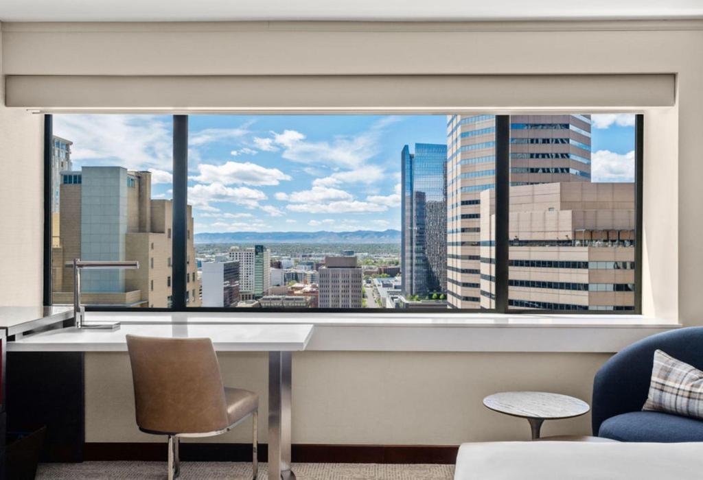 a window in a room with a view of a city at Grand Hyatt Denver in Denver