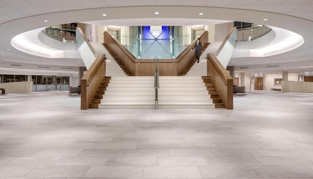 a large lobby with stairs in a building at Hyatt Regency Denver Tech Center in Denver