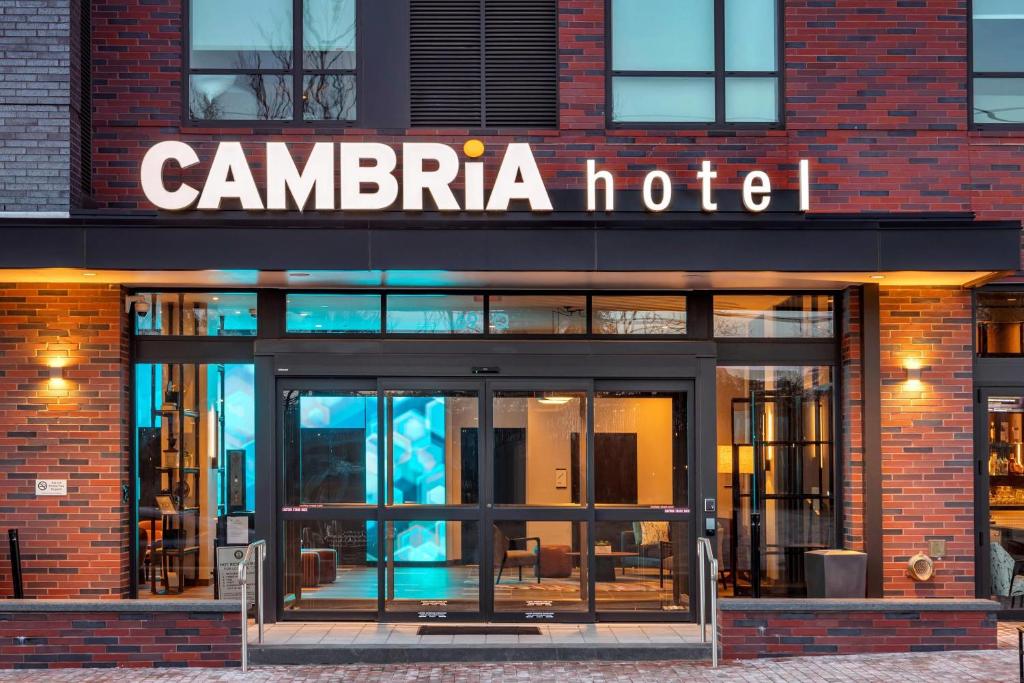 a building with a sign that reads canaria hotel at Cambria Hotel Washington DC Navy Yard Riverfront in Washington, D.C.