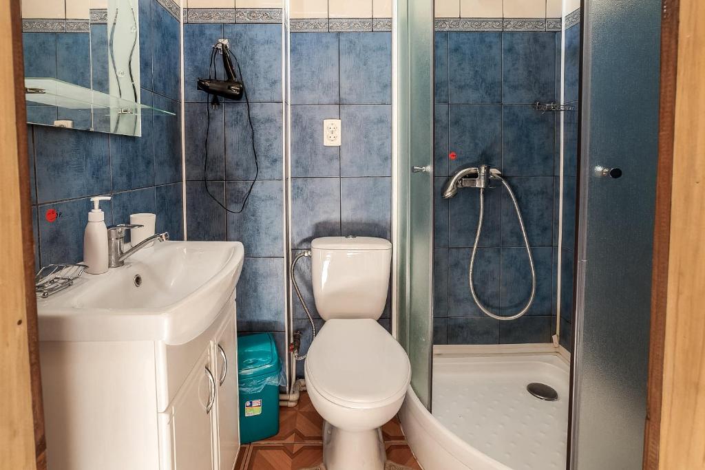 Koupelna v ubytování Vatra Hotel