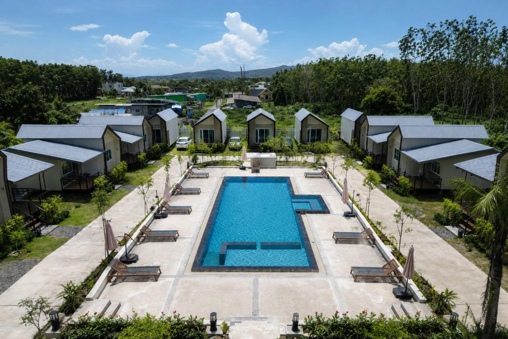 an aerial view of a pool at a resort at NaraRin Phuket Resorts in Thalang