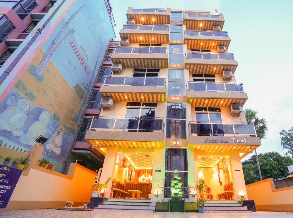 a building with lights on the side of it at Hotel Sea Wood in Digha
