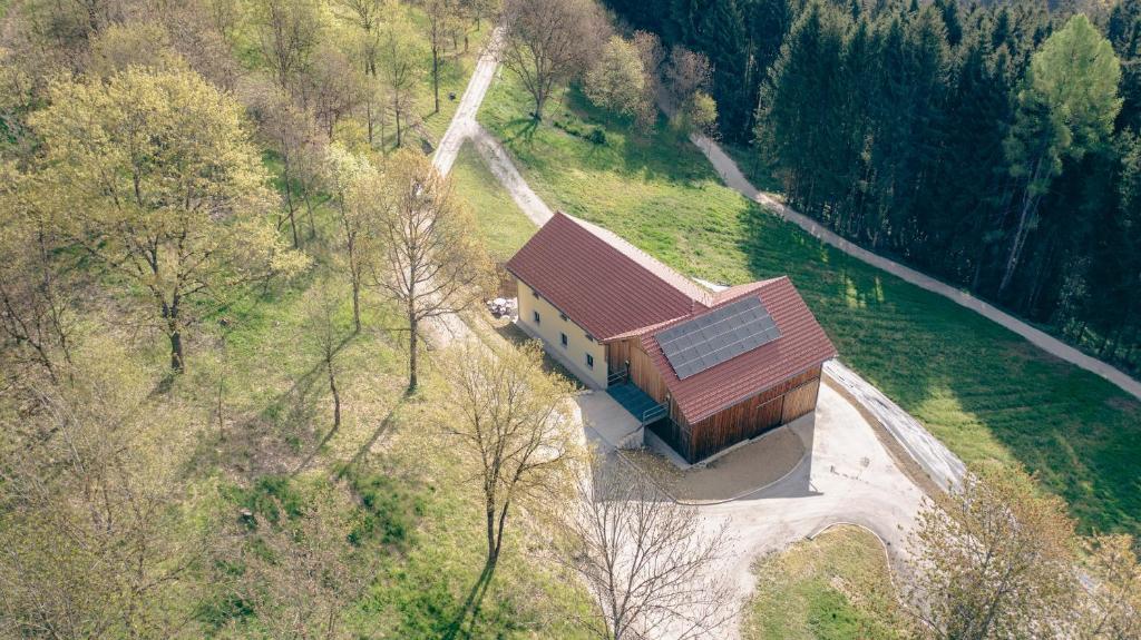 an aerial view of a house with a brown roof at Ferienhaus Allmunzen in Witzmannsberg
