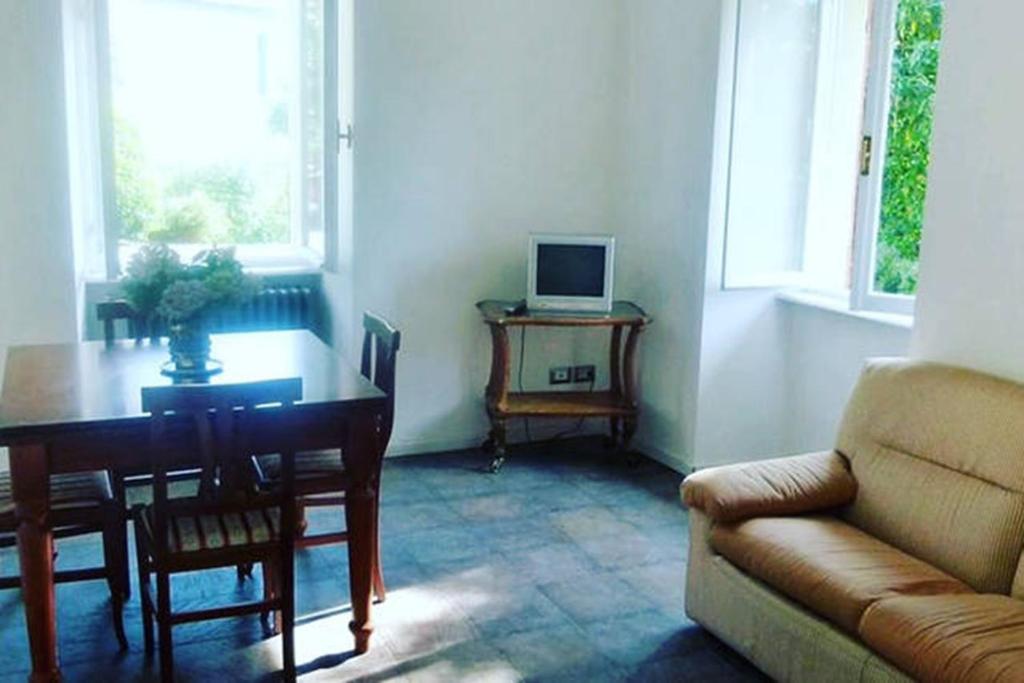 Televízia a/alebo spoločenská miestnosť v ubytovaní Apartment Piccolo Borgo