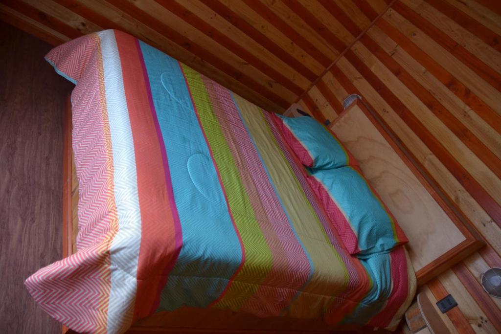 Postel nebo postele na pokoji v ubytování Algarrobo Lodge