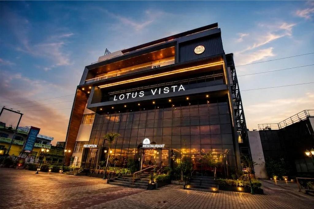 a building with a clock on top of it at Lotus Vista Hotel in Alwar