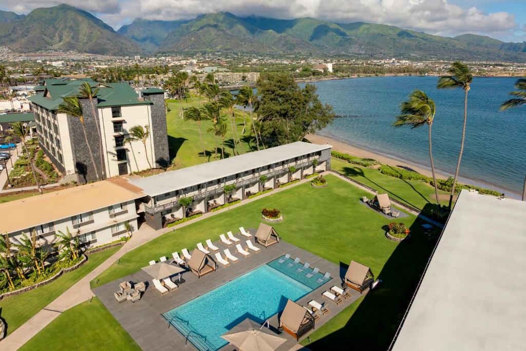 an aerial view of a resort with a swimming pool at Maui Seaside Hotel in Kahului