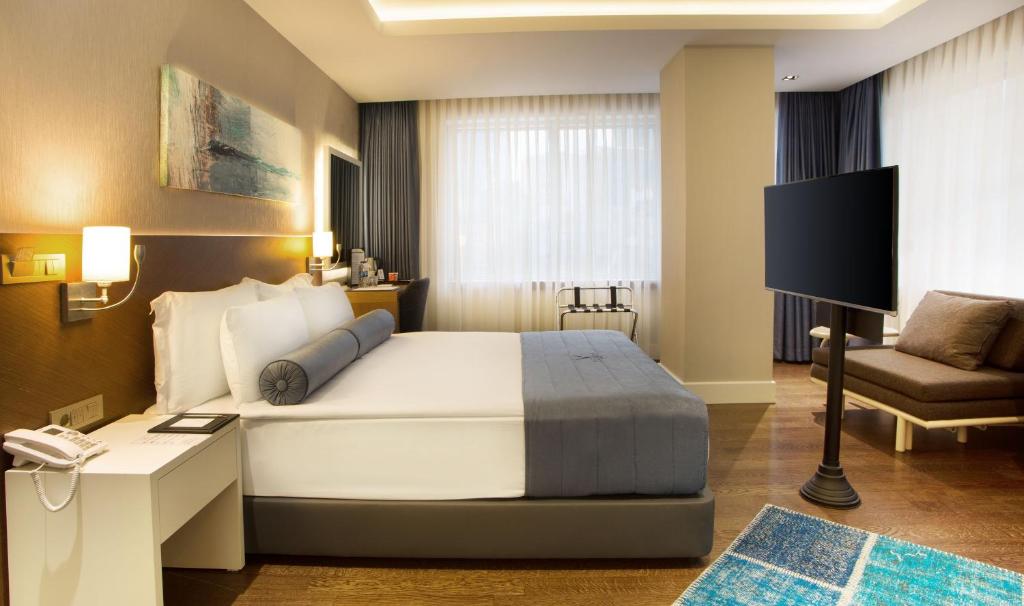 Postel nebo postele na pokoji v ubytování Veyron Hotels & SPA