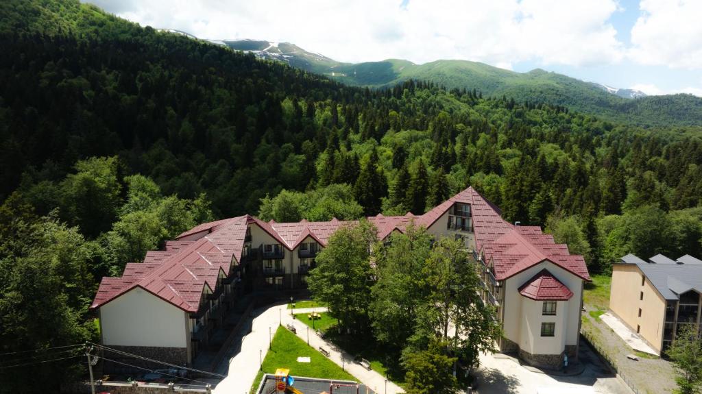 an aerial view of a resort in the mountains at KOMOREBI BAKURIANI RESORT in Bakuriani