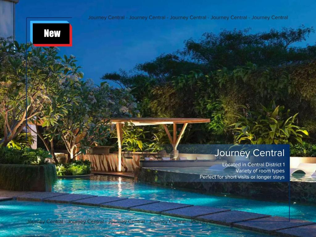 a swimming pool with a pergola next to a resort at Journey Central - ZENITY & D1 MENSION in Ho Chi Minh City