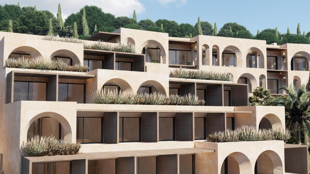 an apartment building with plants on the facade at Ella Elyra - Adults Only in Pelekas