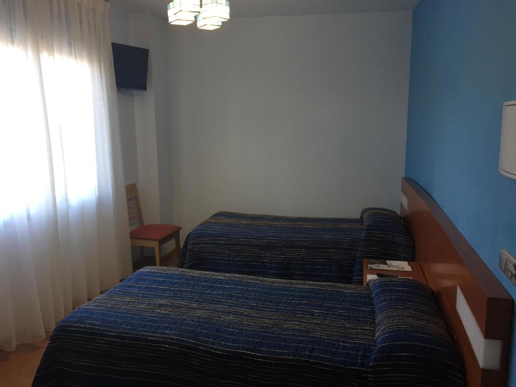 Postel nebo postele na pokoji v ubytování Altejo