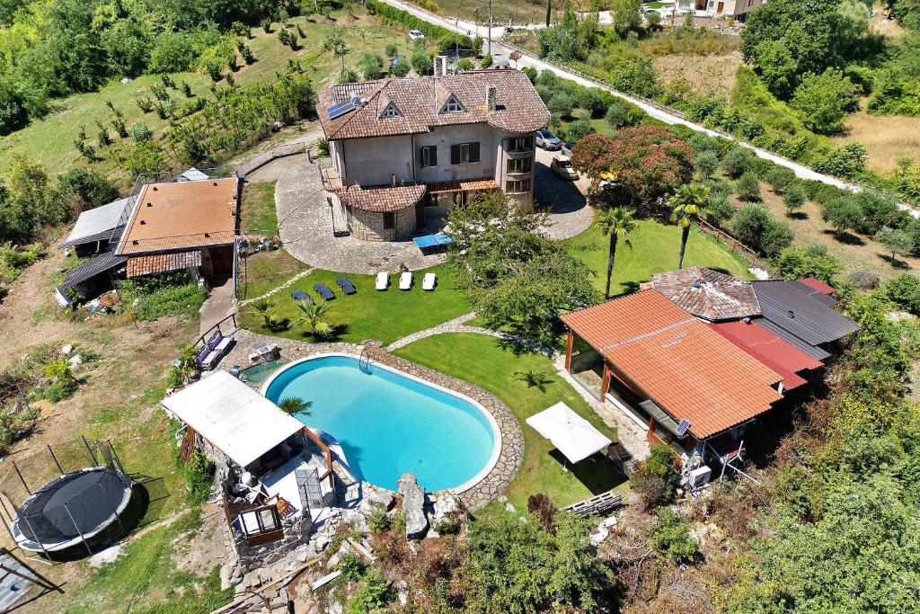 an aerial view of a house with a swimming pool at Villa Aresini - Dimora Esclusiva in Montemiletto