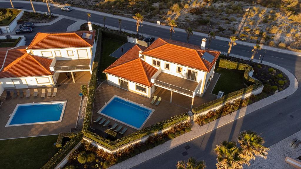 an overhead view of a house with an orange roof at Marvellous Villa in Óbidos