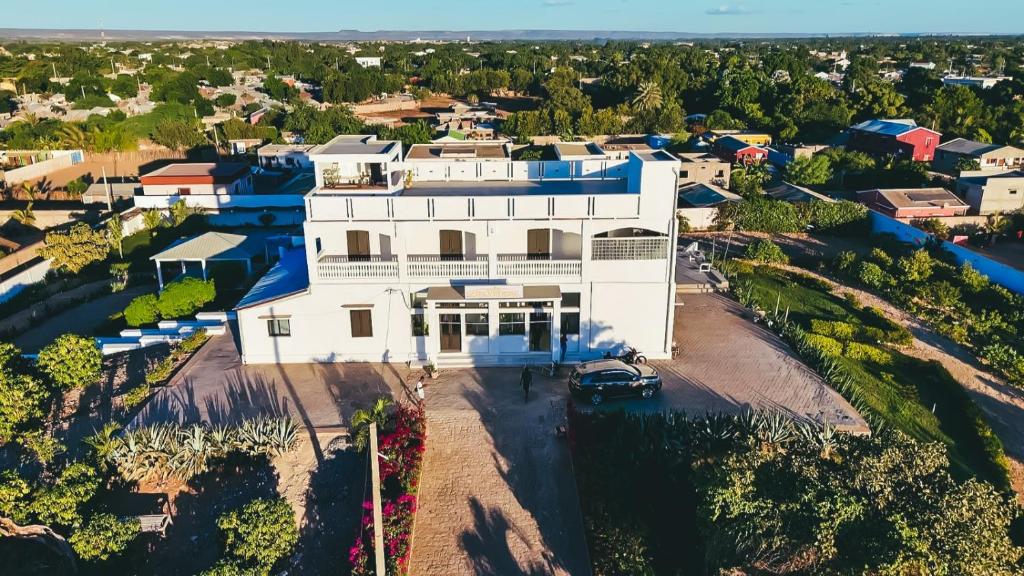 an aerial view of a large white house at Belvédère Hôtel in Toliara