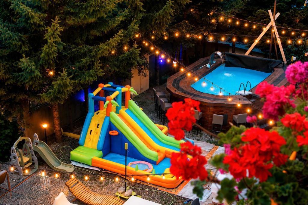 a christmas display of a swimming pool and an inflatable at ODAYA Social Hotel Bansko in Bansko